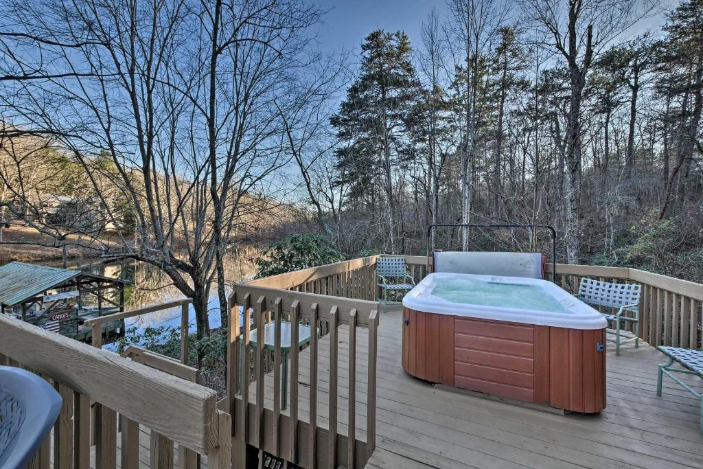 Spacious Waterfront Retreat with Dock and Hot Tub
