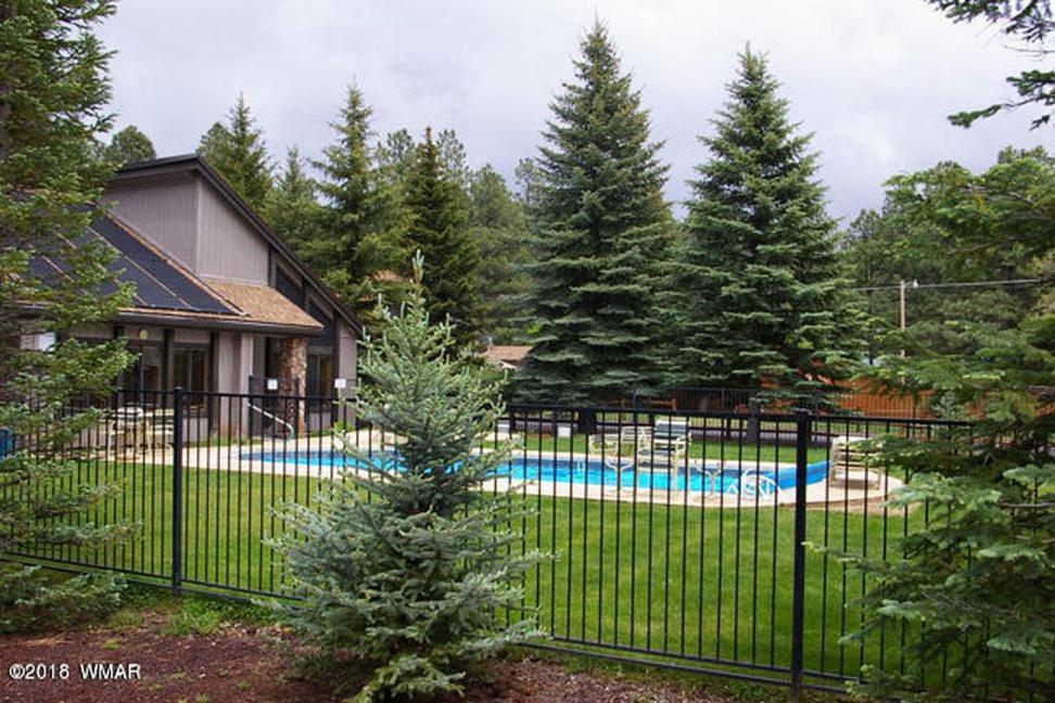 2BR Gated Escape With A Pool And Walk to Dining and Trails - Image 4