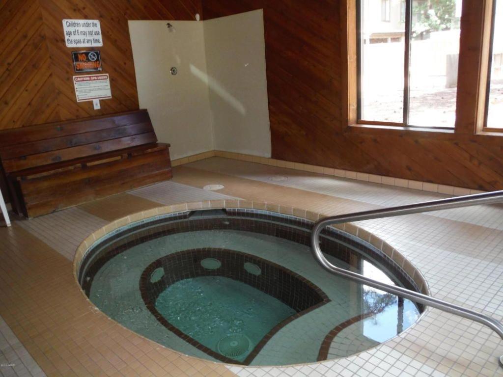 2BR Gated Escape With A Pool And Walk to Dining and Trails