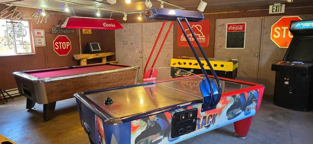 King Suite with a Full Kitchen and Balcony at the Cedaredge Lodge - Image 7