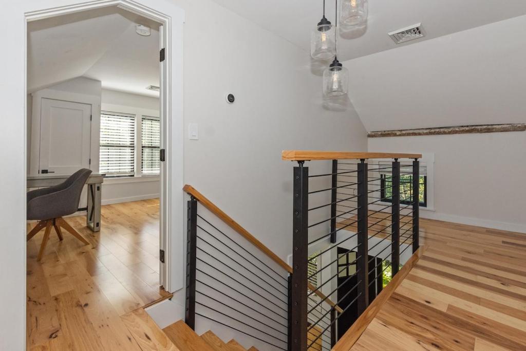 Modern Waterfront Retreat with Hot Tub & Pond Views - Image 7