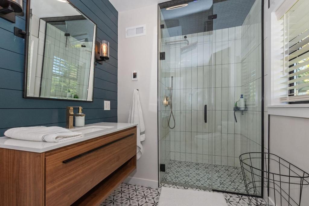 Modern Waterfront Retreat with Hot Tub & Pond Views - Image 8