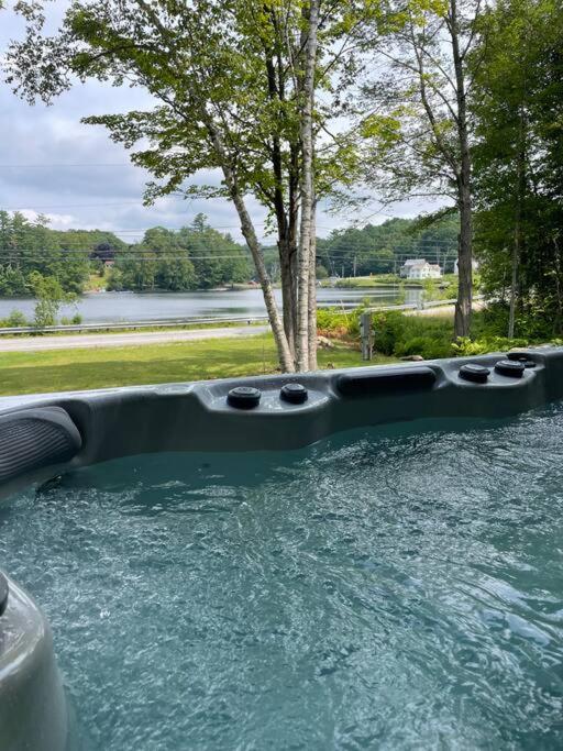 Tranquil Waters - Modern Lakefront Haven with Hot Tub - Explore, Relax, and Recharge! Close to UMF!