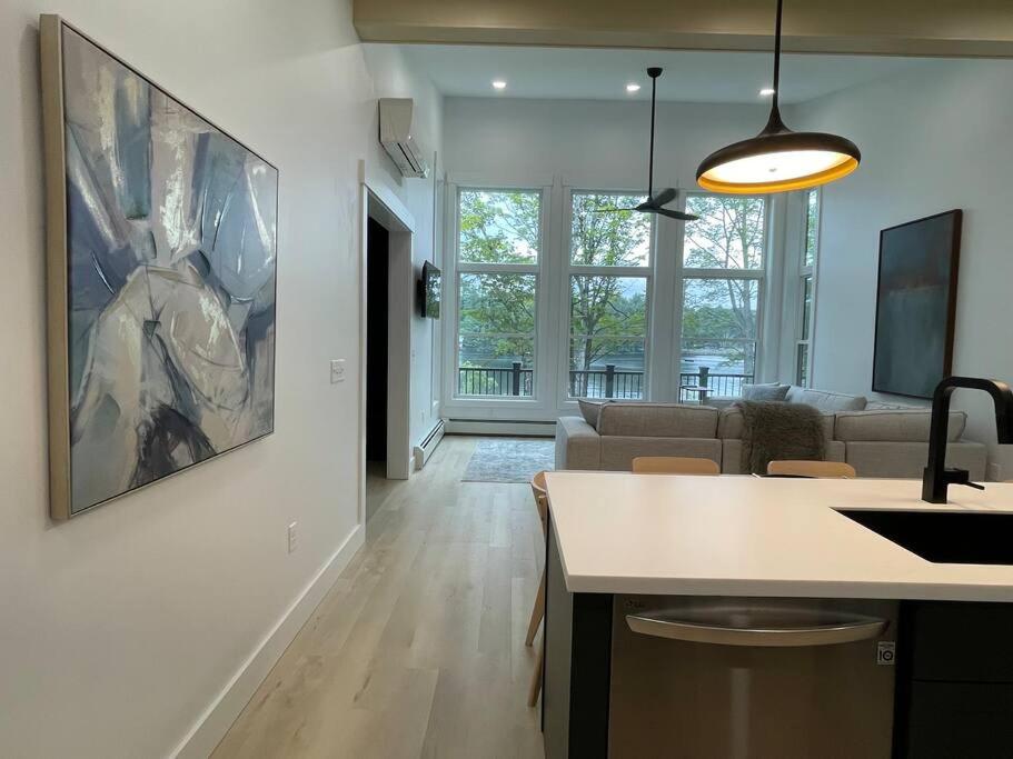 Tranquil Waters - Modern Lakefront Haven with Hot Tub - Explore, Relax, and Recharge! Close to UMF! - Image 6