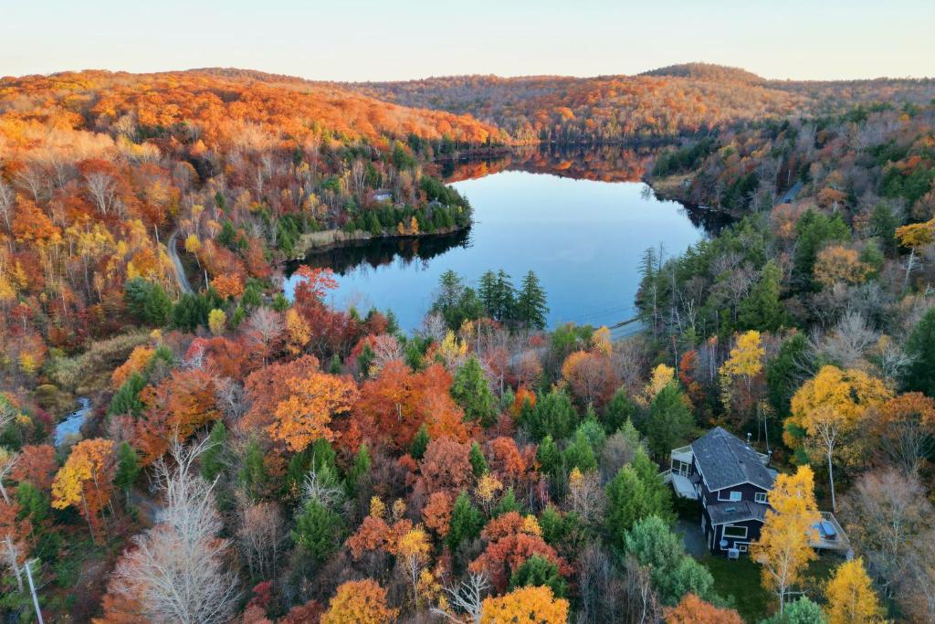 Lakefront Otis Home with Stunning Views and Boats!