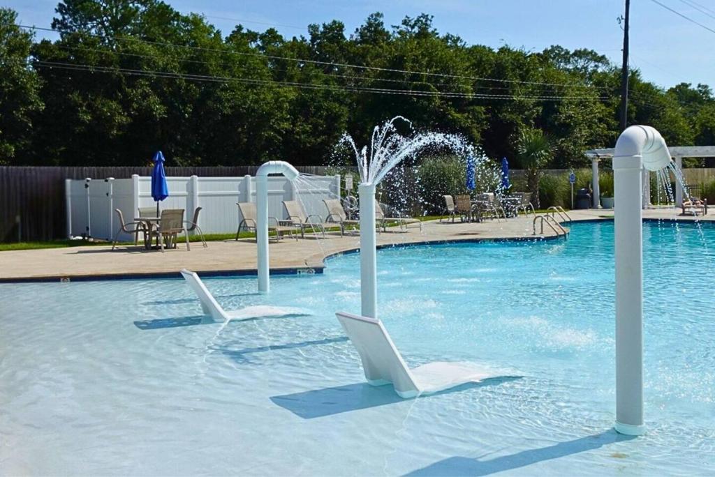 Coastal Serenity-Family Beach Escape, 2 Min to Beach, Pools, Hot Tub