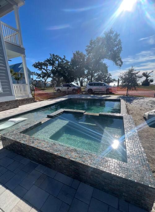 Walk to Beach with Heated Pool Spa views & oak trees