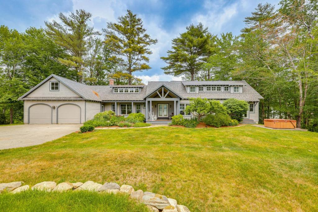 Lakefront New London Retreat with Dock and Hot Tub!