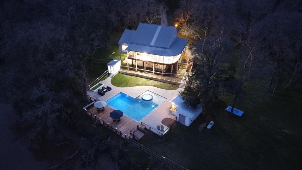 The San Bernard River waterfront provides private access to a spa, boat ramp, and jet skiing